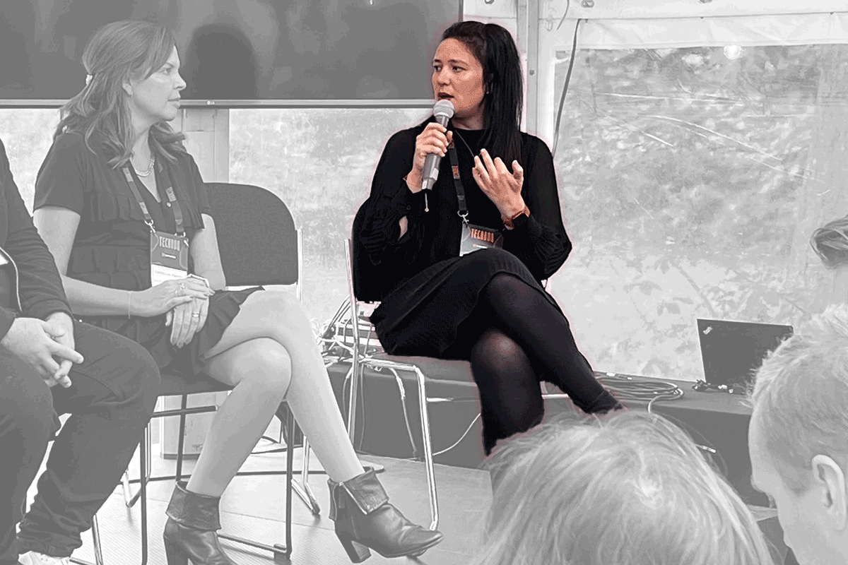 Judie Alvarez speaking on go-to-market strategy at startup conference